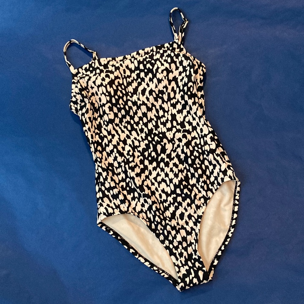 • Black & tan speckled one-piece •